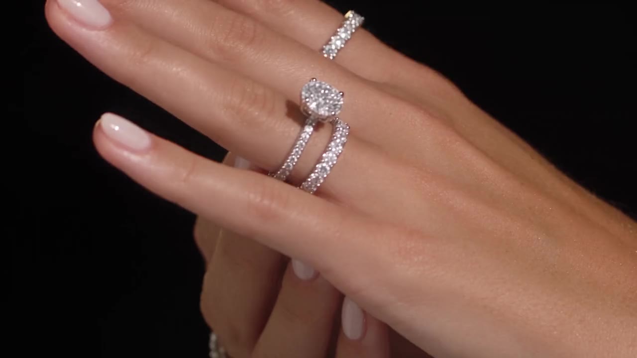 A Seen Studio film frame of a diamond ring on a hand.